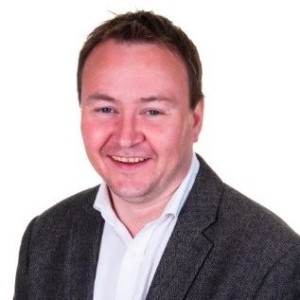 A photograph of Richard Chapman, Chief Finance Officer for NHS Frimley